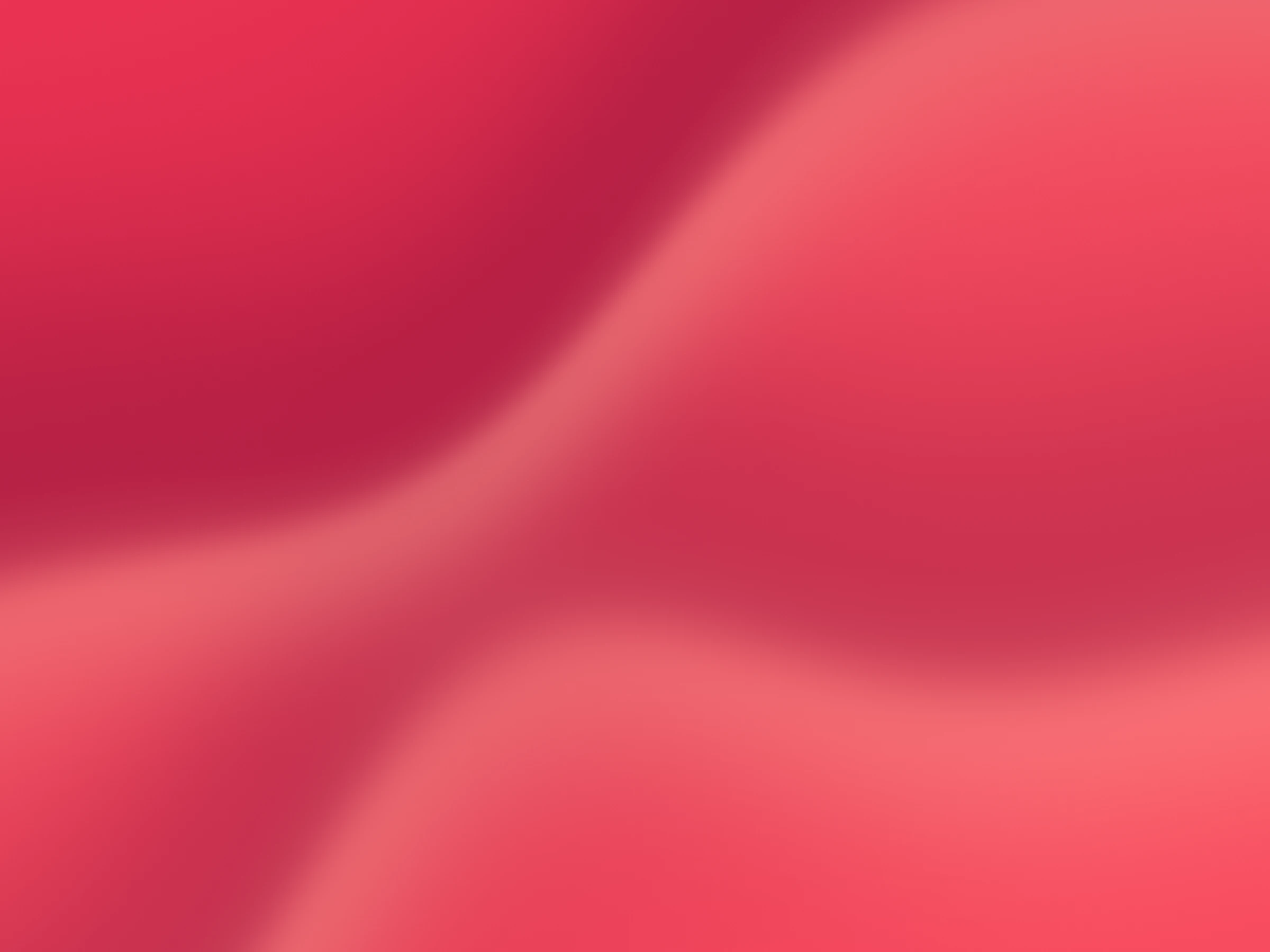 Vivid coral abstract folds with soft blurred edges